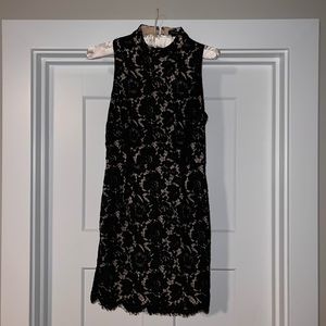 Like new. Black lace semi formal dress. Size S